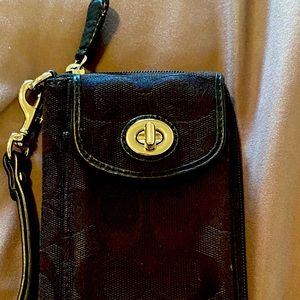 Coach phone case and wallet.